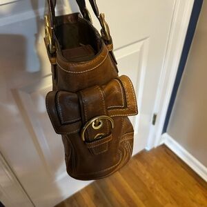 Gently used brown leather coach tote bag with matching wallet